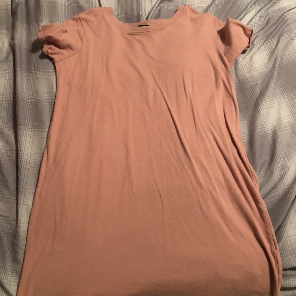Light pink/blush colored T-shirt dress.